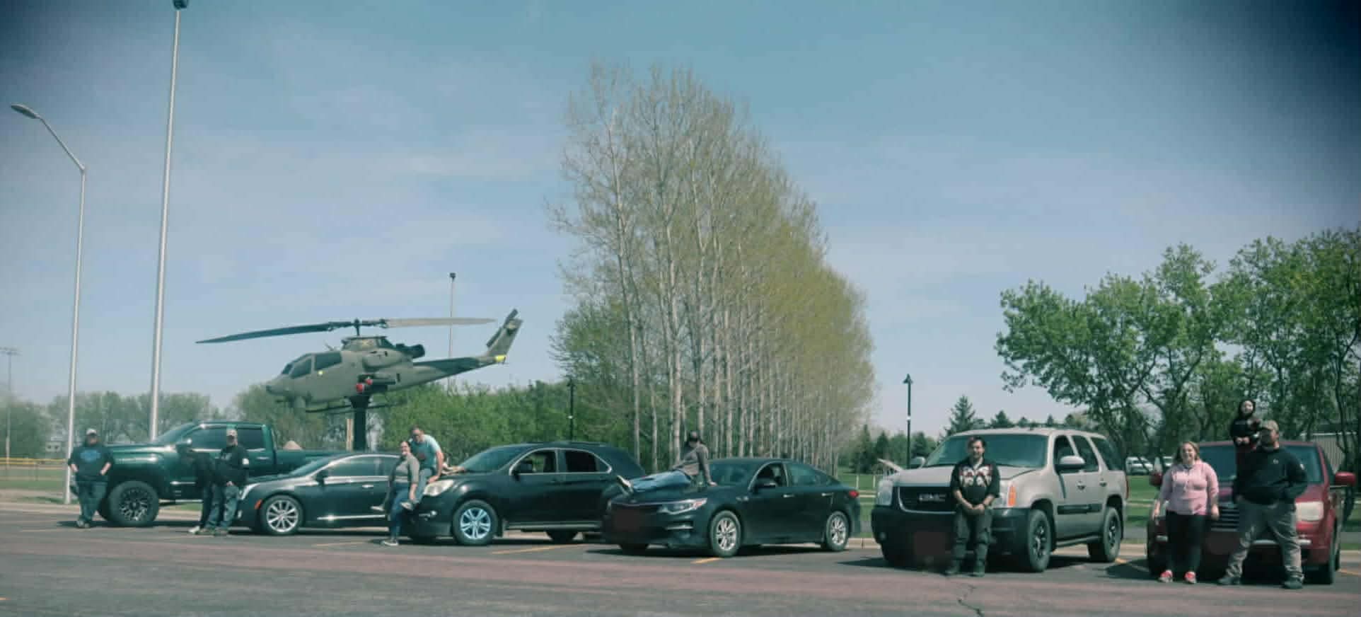Rise & Drive team with their vehicles